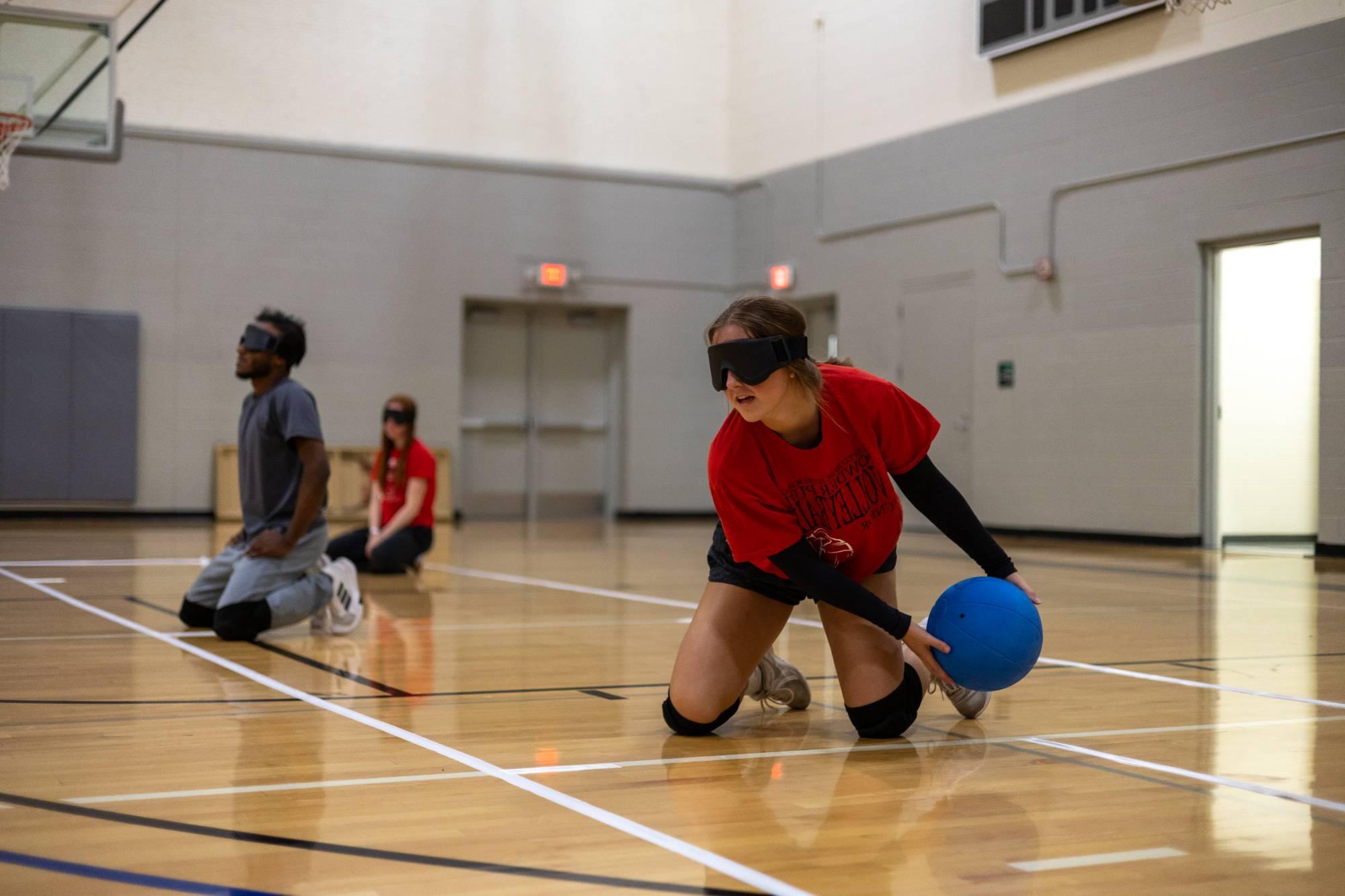 Student playing goalball at an adaptive intramural sports event